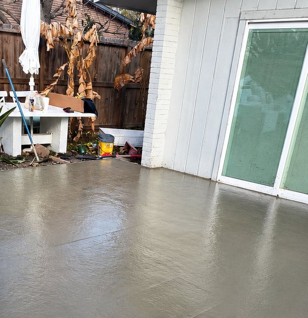 Freshly poured concrete patio foundation