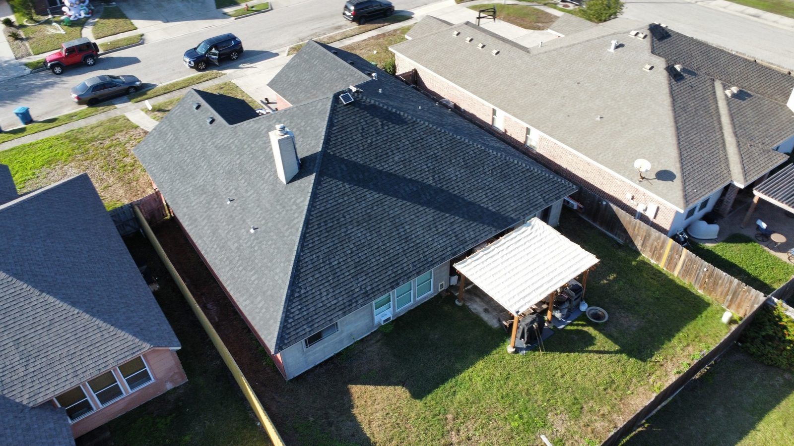 Completed residential roof replacement, drone view
